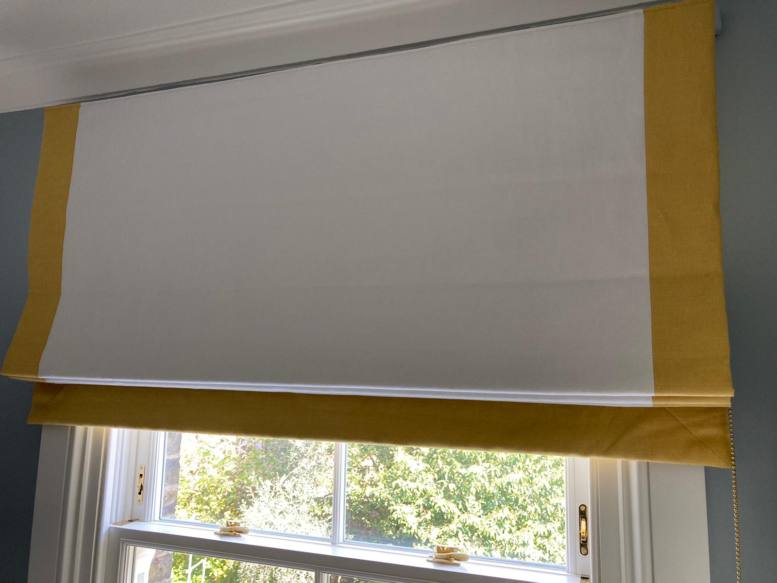 Roman Blind Yellow Border Bespoke Roman blind with a decorative contrast border